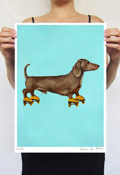 Dachshund with rollerskates Art Print by Coco de Paris