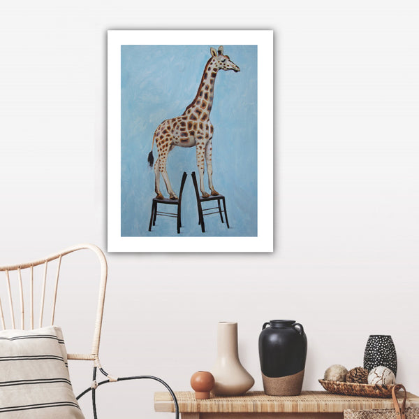 Giraffe standing on 2 chairs Art Print by Coco de Paris