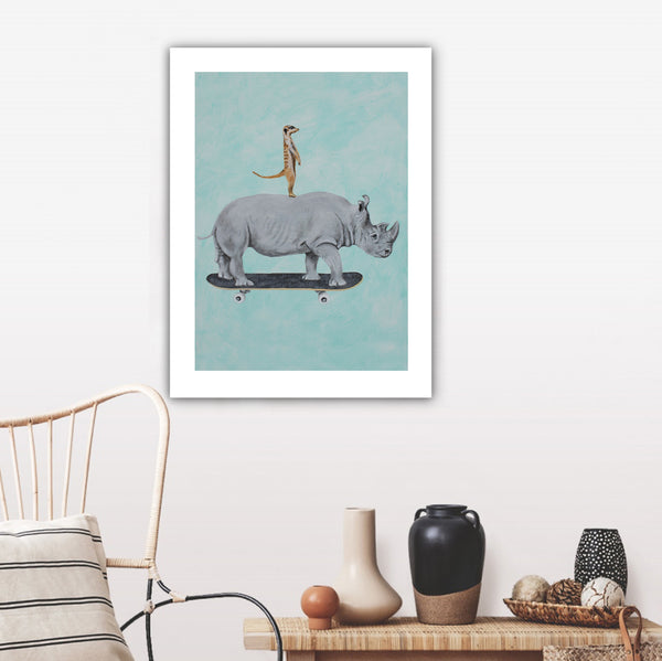 Rhinoceros and meerkat skateboarding Art Print by Coco de Paris